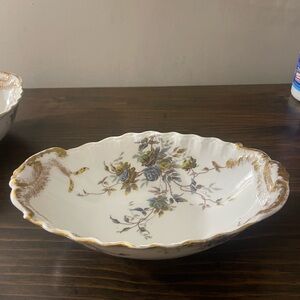 Vintage!! The item is an antique porcelain bowl, possibly from Limoges, France.